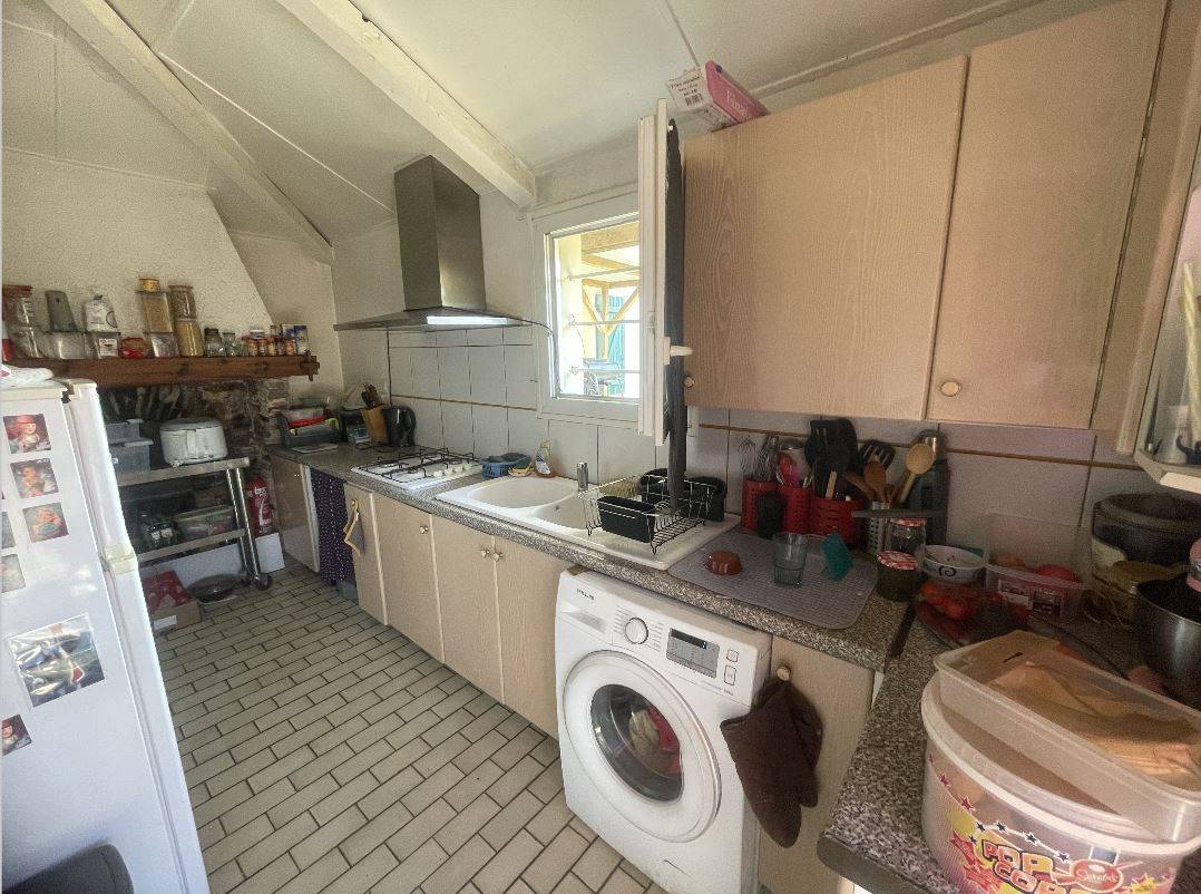 Maison de pays de plain pied à vendre avec 3 chambres sur un grand terrain à Biscarrosse Bourg