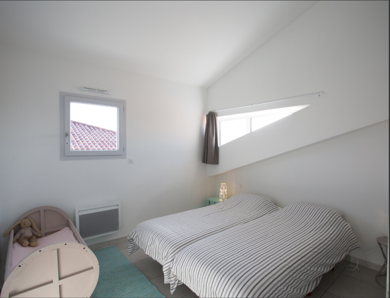 Chambre enfants avec lits superposés : parfait pour accueillir petits et grands